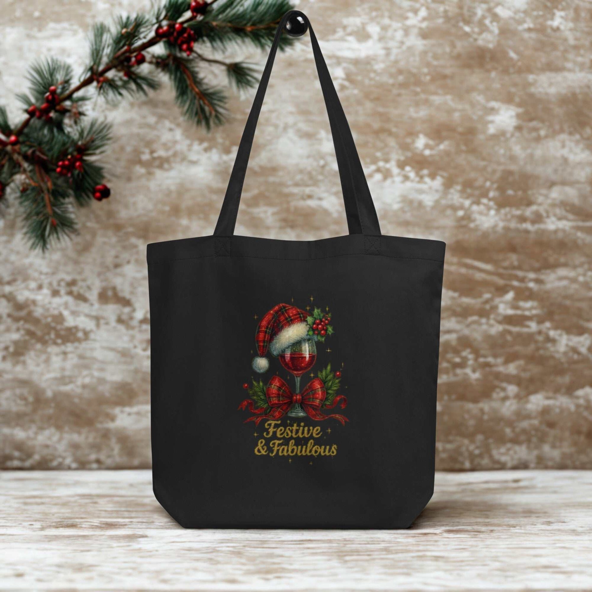 Black Eco Tote Bag with festive holiday design and "Festive & Fabulous" text, eco-friendly reusable shopping bag