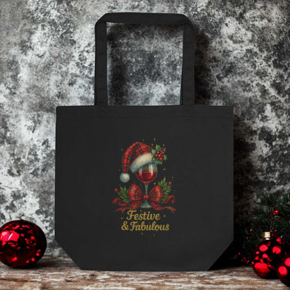 Black eco tote bag with festive holiday wine glass design and "Festive & Fabulous" text