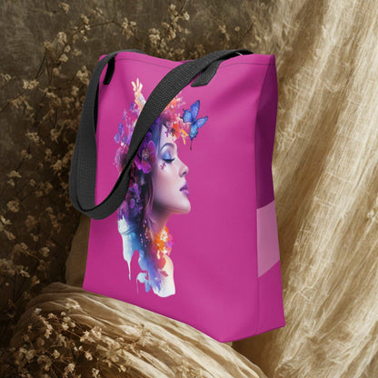 Mystic Butterfly Tote Bag in pink with artistic female face and butterfly design, black handles, eco-friendly and spacious.