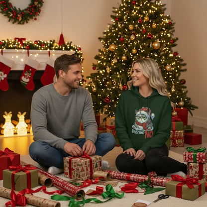 Woman wearing green Dashing Through The NO Hoodie with grumpy cat and Santa hat design in clothing store