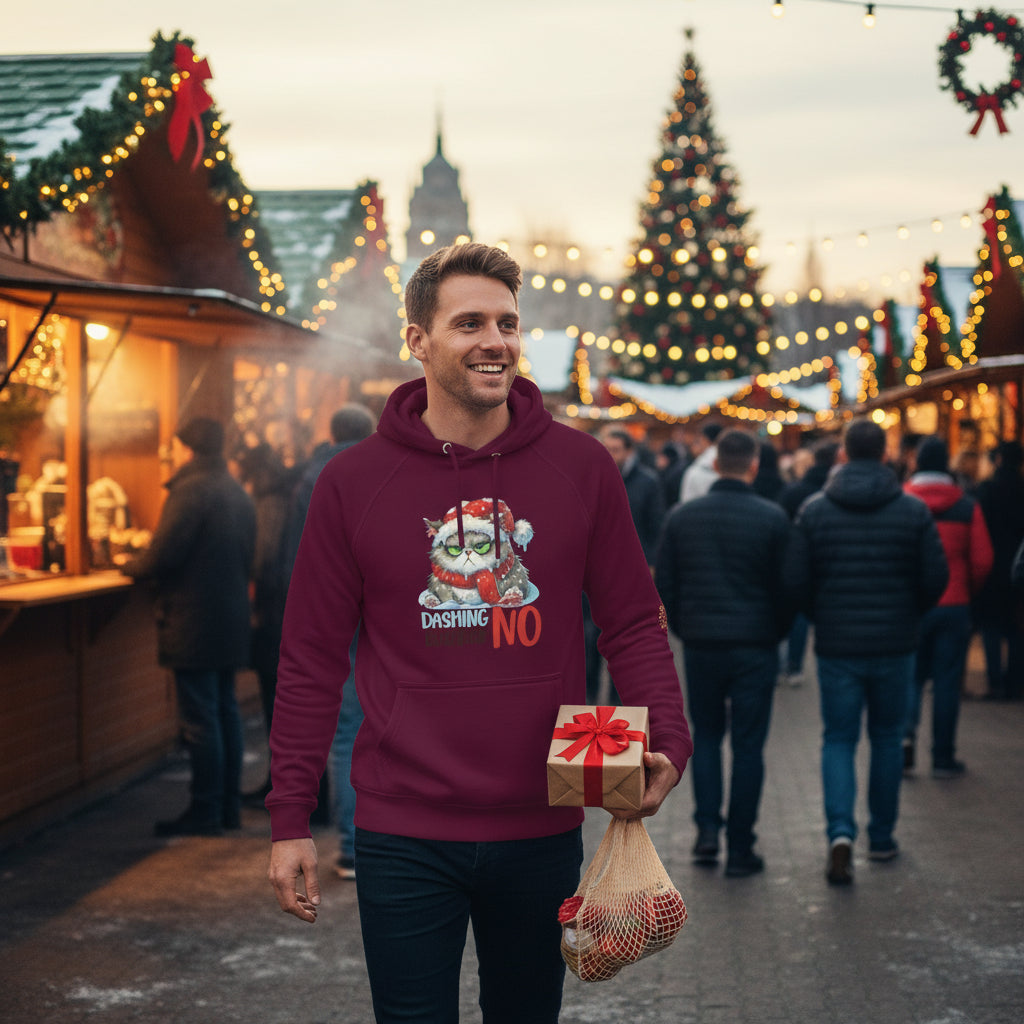 Man wearing maroon Dashing Through The NO Hoodie with grumpy Christmas cat design at holiday fair buying presents