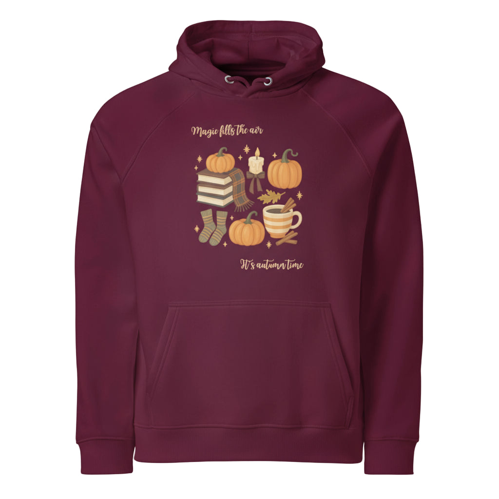 Magic Fills the Air Hoodie in burgundy with autumn-themed design featuring pumpkins, books, and cozy elements.