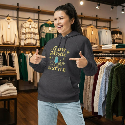 woman wearing charcoal Glow Mystic in Style Hoodie with graphic design in clothing store