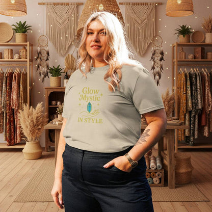 Woman wearing Glow Mystic in Style organic cotton t-shirt with gold logo in a boho-style room