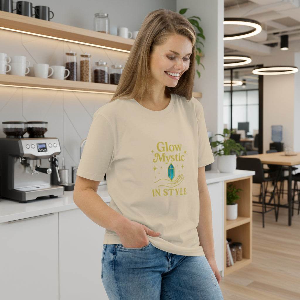 Woman wearing Glow Mystic in Style organic cotton t-shirt with gold logo in modern kitchen interior
