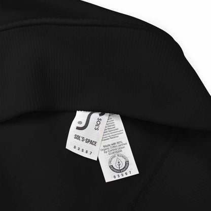Close-up of black Festive & Fabulous organic sweatshirt label showing fabric and care details