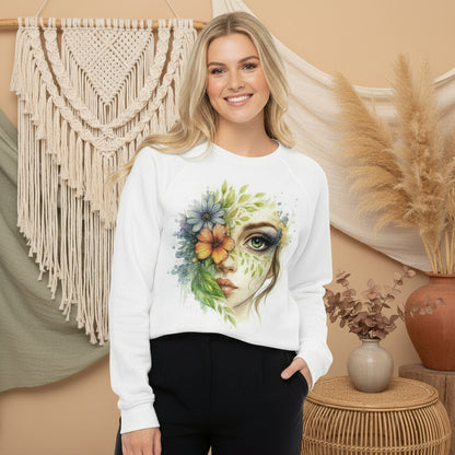 Woman wearing white eco-friendly Floral Face Sweater with artistic watercolor flower and face design