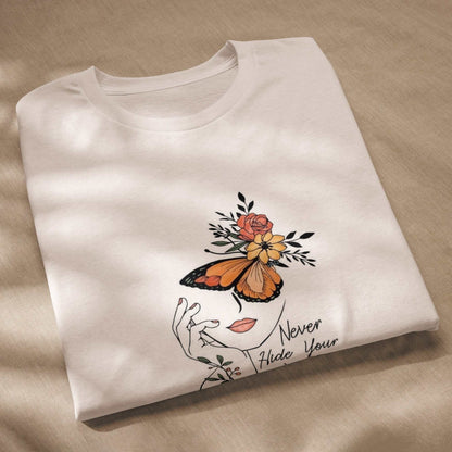 Folded white Butterfly Graphic Organic Cotton T Shirt with orange butterfly and floral design on front