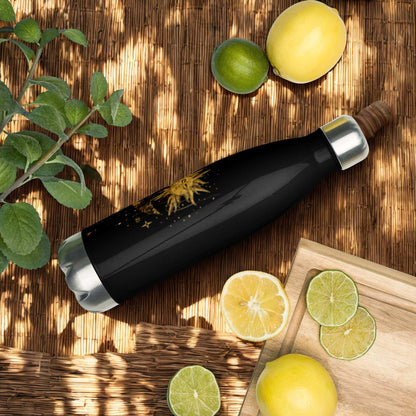 Mystic Sun and Moon Stainless Steel Water Bottle with celestial design on black, surrounded by lemons and limes on wooden surface