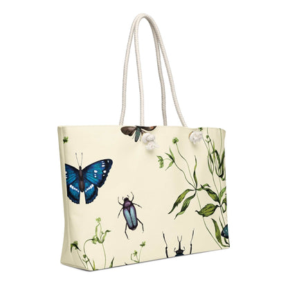 Oversized Weekender Bag with vintage botanical prints of butterflies and beetles, featuring soft rope handles and spacious design for travel essentials